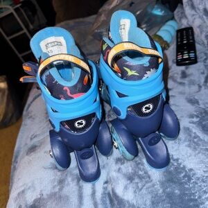 Adjustable Kids Roller Skates in Blue with Colorful Dino Print